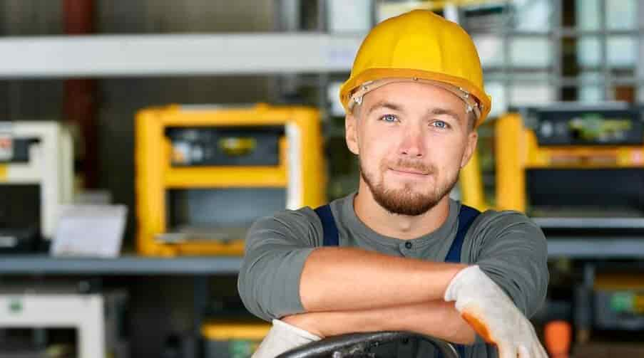 Young Workman Smiling at Camera